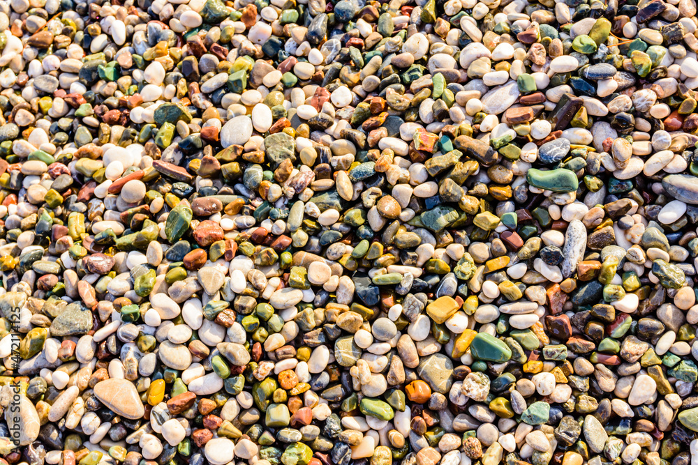 Texture of pebbles at the seaside. Natural background Texture of pebbles at the seaside. Natural background