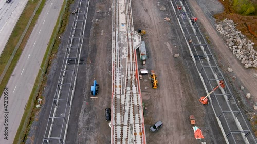 4K camera drone, ultra definition aerial view of the construction site of the new Fairview Station of the REM (Metropolitan Express Network) in Pointe Claire, Montreal.
