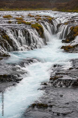 Picturesque waterfall Bruarfoss autumn view. Season changing in southern Highlands of Iceland.