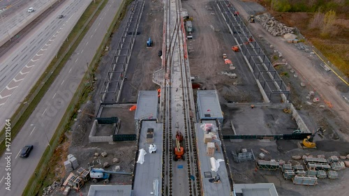 4K camera drone, ultra definition aerial view of the construction site of the new Fairview Station of the REM (Metropolitan Express Network) in Pointe Claire, Montreal. photo