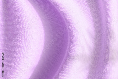 Abstract background,  purple fabric with a curved texture and natural gradation of shadows.for graphic design ,spacefor text photo