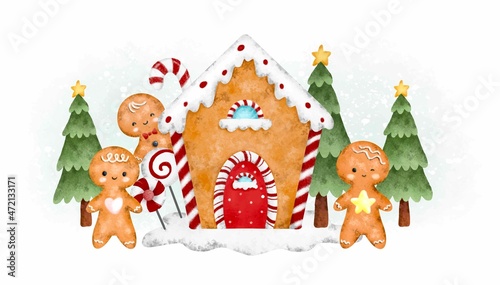 Gingerbread family with gingerbread house photo