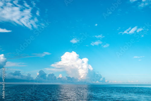 Cloud over Still Ocean in Florida Keys (ID: 472135741)