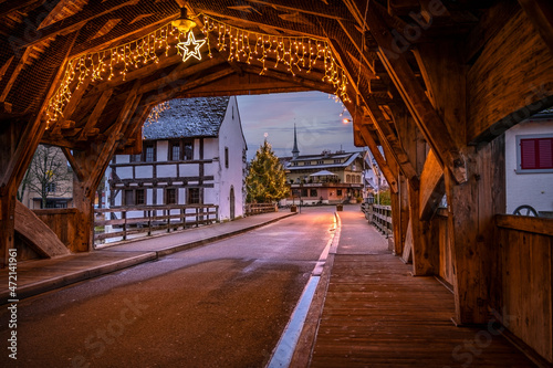 old wooden bridge with christmas dekor 