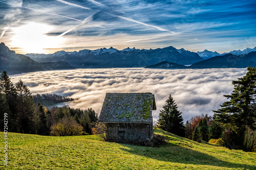 old wooden hut in the alps photo