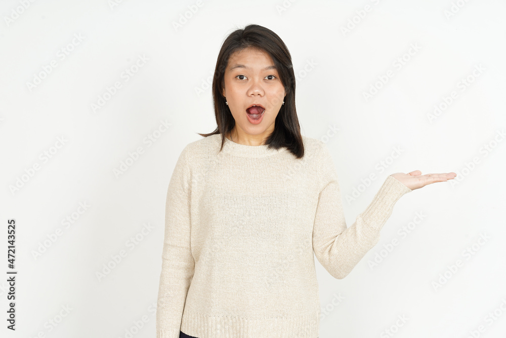 Showing recommended product on open palm of Beautiful Asian Woman Isolated On White Background