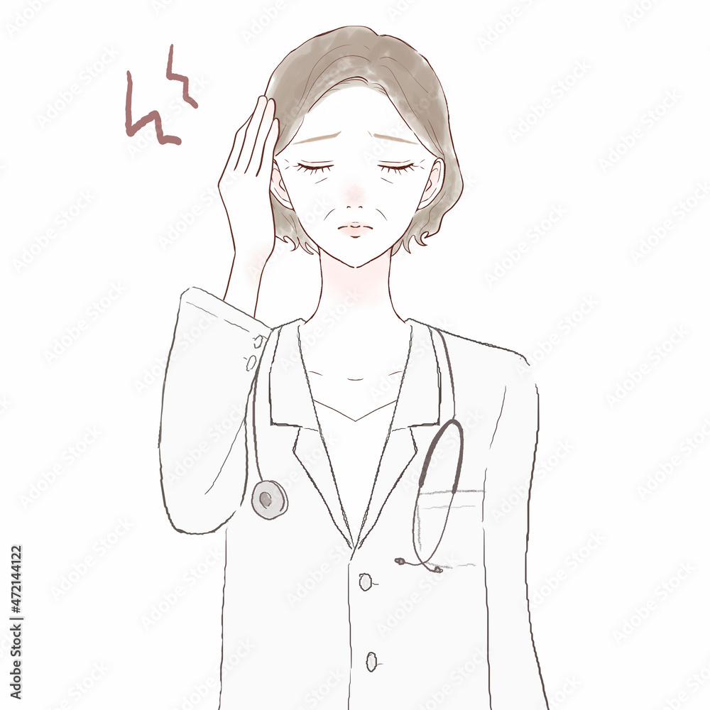 頭痛に悩む中年の女性医師 頭痛に悩む中年の女性医師