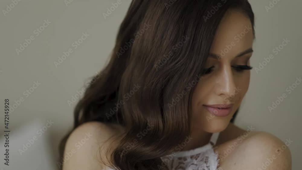 beautiful brunette portrait slow motion video. morning of the bride beautiful brunette portrait slow motion video. morning of the bride