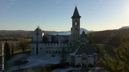 Quiet View Of The Famous Abbaye St. Benoit du Lac In Quebec Canada - aerial shot photo