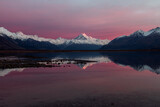 Reflection of Mt.Cook in Lake Pukaki on sunrise. Aoraki/Mt Cook is popular tourist attraction located on South Island of New Zealand.