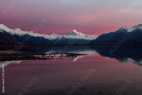 Reflection of Mt.Cook in Lake Pukaki on sunrise. Aoraki/Mt Cook is popular tourist attraction located on South Island of New Zealand.