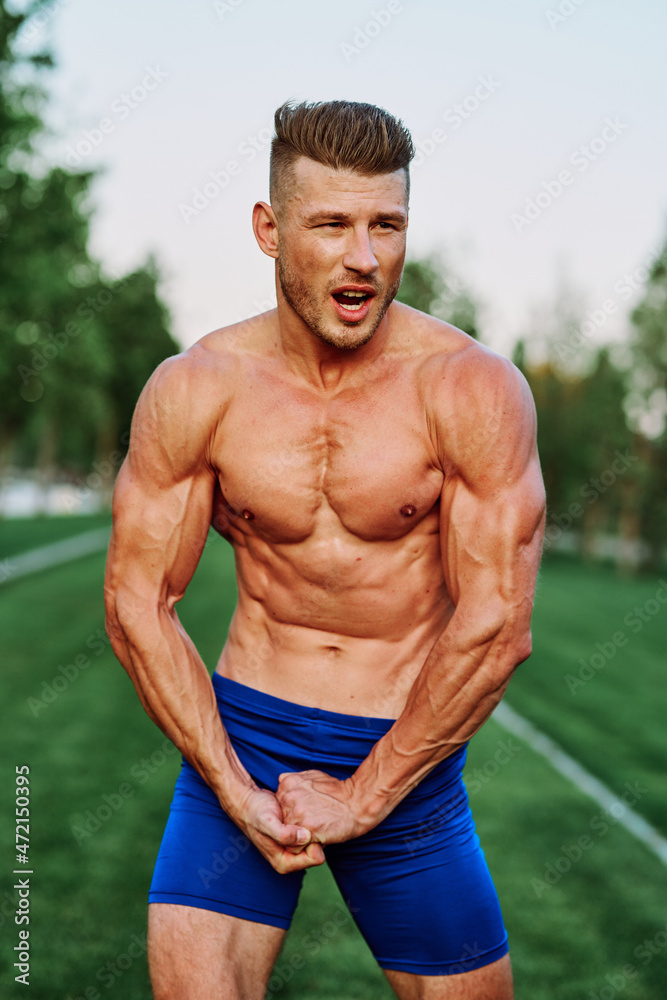 man with pumped up muscular body outdoors health workout man with pumped up muscular body outdoors health workout