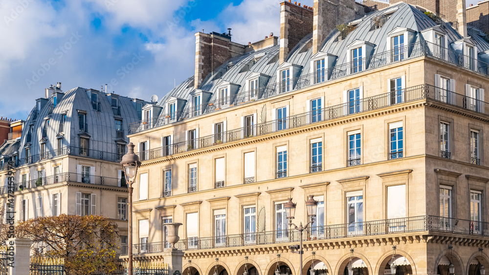 Paris, panorama of the rue de Rivoli, typical building, parisian facade

