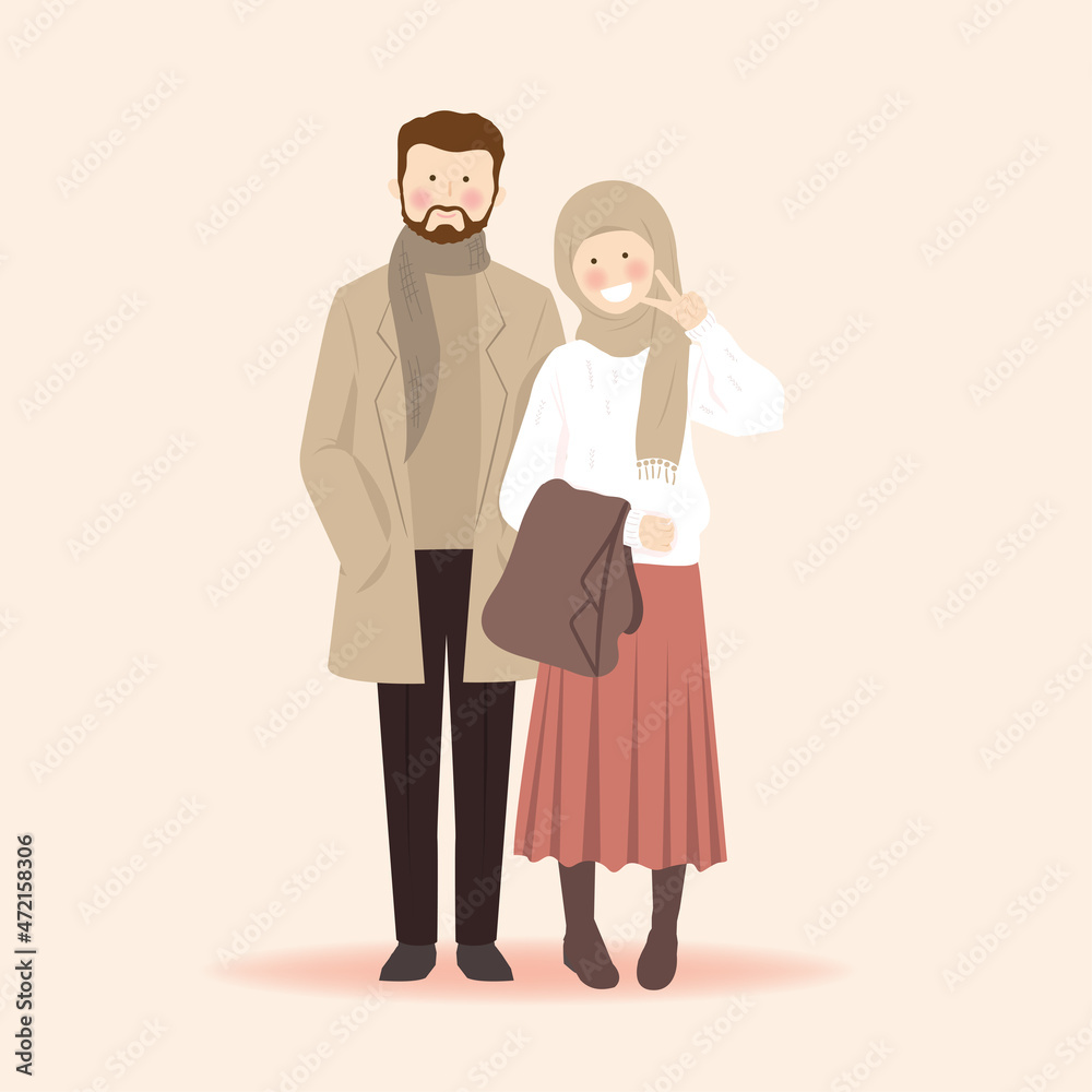 Cute muslim Couple in fall autumn outfit taking photo and pose with peace sign Cute muslim Couple in fall autumn outfit taking photo and pose with peace sign