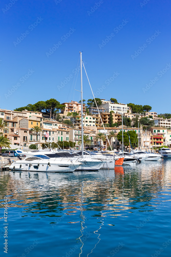 Port de Soller town on Mallorca marina with boats travel traveling holidays vacation portrait format in Spain
