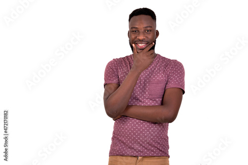 young man with crossed arm and raised hand under chin.