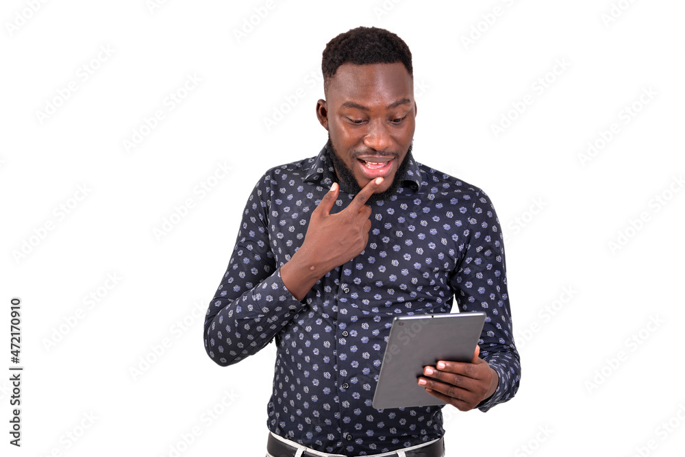 portrait of a young man communicating using a tablet portrait of a young man communicating using a tablet