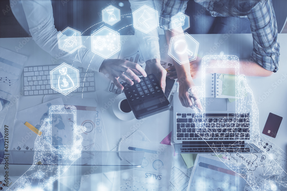 Double exposure of man and woman working together and technology theme drawing. Computer background. Top View. High tech concept. Double exposure of man and woman working together and technology theme drawing. Computer background. Top View. High tech concept.