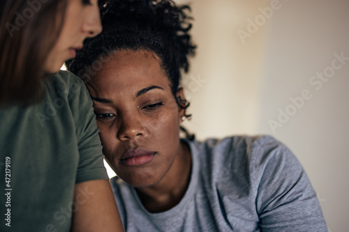 Sad african-american woman, sharing her problems photo