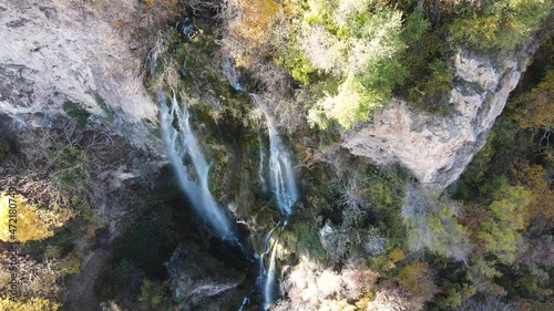 Aerial Autumn view of Polska Skakavitsa waterfall at Zemen Mountain, Kyustendil Region, Bulgaria photo