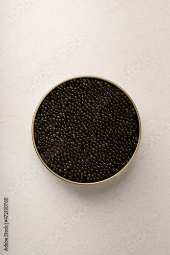 Black caviar in a metal jar