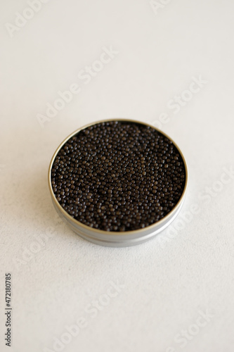 Black caviar in a metal jar