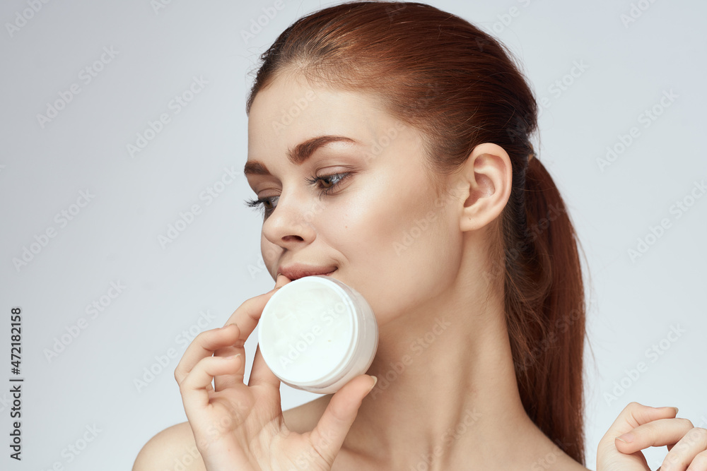 woman with jar of cream makeup face skin care close-up woman with jar of cream makeup face skin care close-up