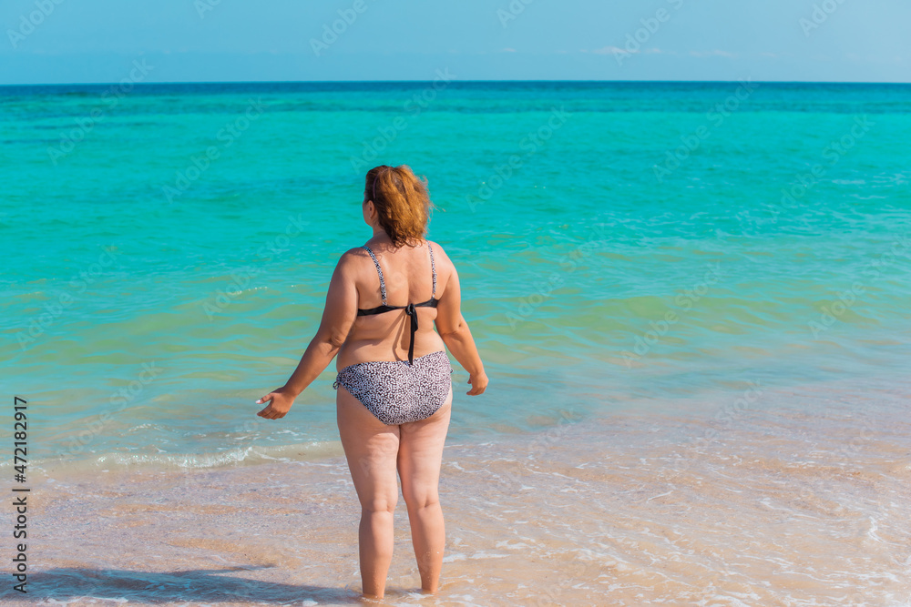 Plus size lady meditation at vacation, Holidays and enjoy the life, concept of mature women life, Body positive
