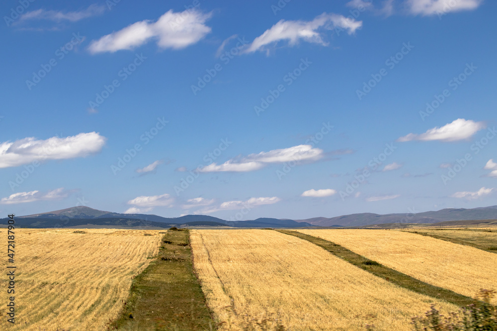 landscape fields  with sky and clouds