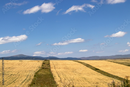 landscape fields  with sky and clouds