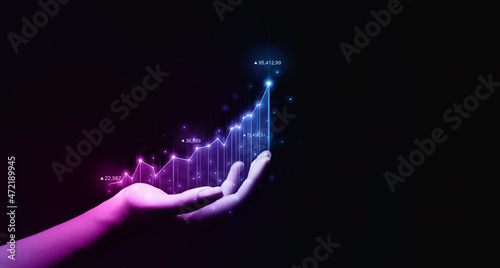 Global financial trading business stock market chart. Finance graph trade and profit investment. Businessman holding arrow up with graph of business analysis. Global business industry development. 