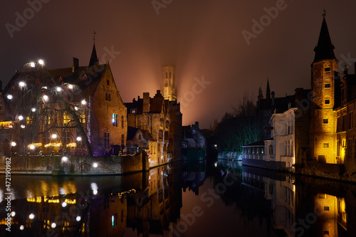 Christmas in Bruges, Belgium. Romantic city in the evening fog. Travel and tourism in Europe