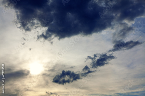 Wallpaper Mural Sun glowing in grey clouds . Black and grey clouds with sunset  Torontodigital.ca