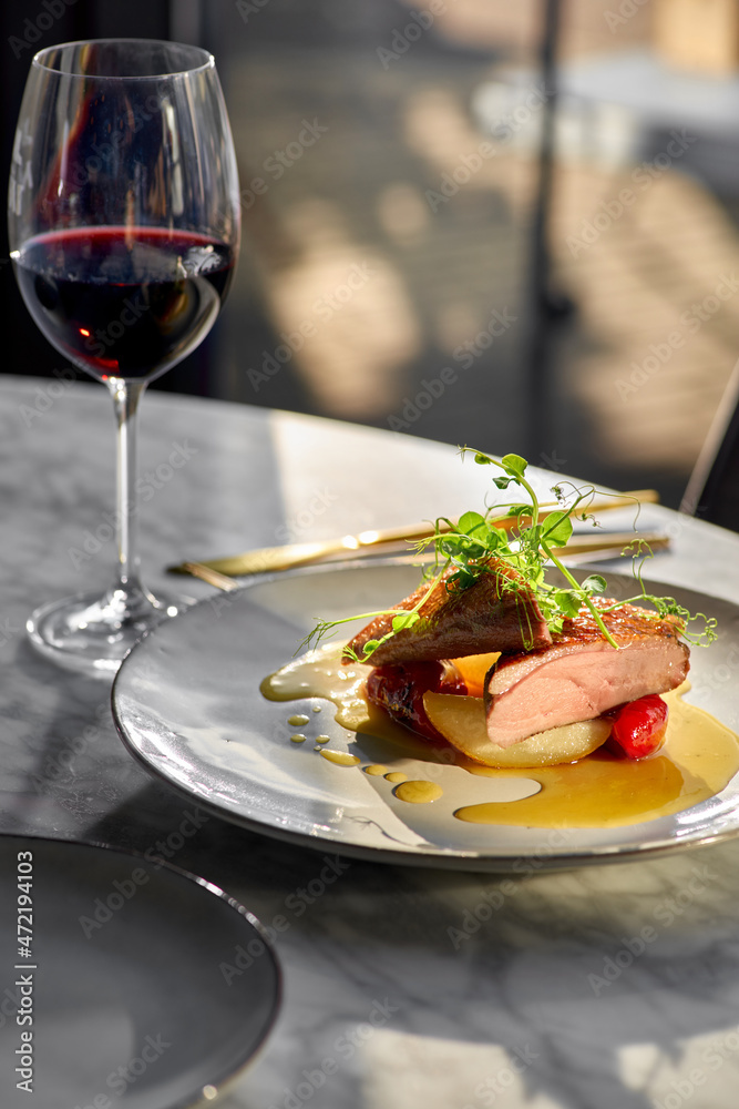 Duck breast with pears in orange-ginger sauce.