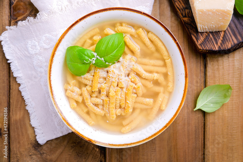 Italian soup. Parmesan Pasta Passatel. Traditional Italian food from the northern regions. Close-up . Place for text. Above photo