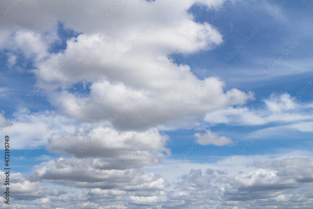 Cloudy sky with large white fluffy air clouds Cloudy sky with large white fluffy air clouds