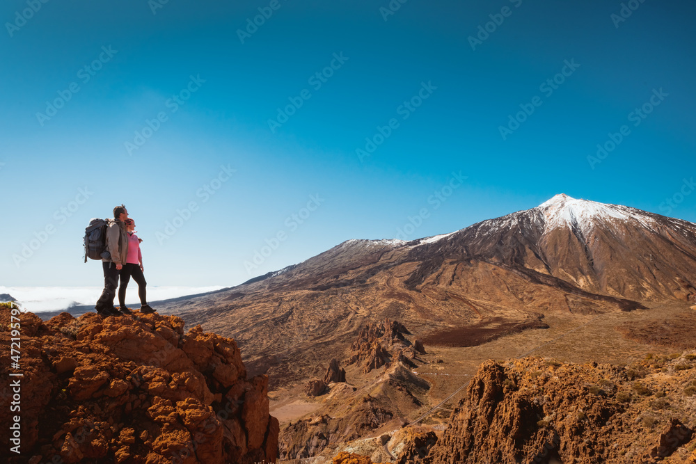 Fototapeta premium sporty couple on top of mountain. Tenerife Canary