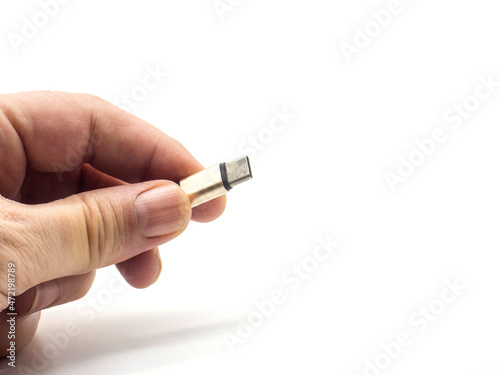 Man holding USB-C connection cable