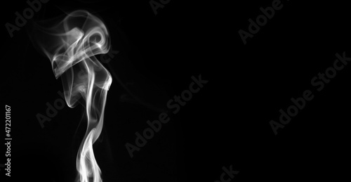 Smoke effect on a black background. Fog or mist texture, abstract and flowing