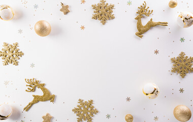 Christmas and new year background concept. Top view of Christmas decoration made from christmas ball, snowflake and reindeer white background.