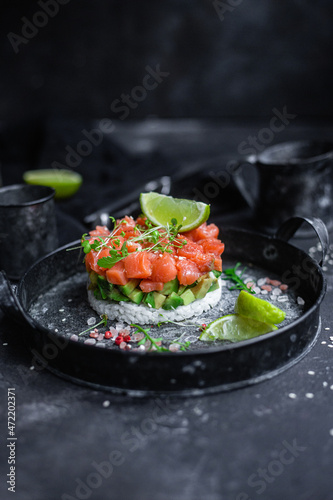 salmon and avocado tartare on a plate