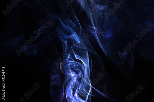 Blue smoke flow and movement abstract background photo