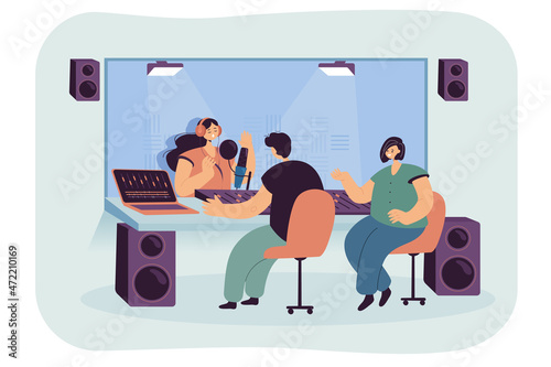 Sound engineer sitting on chair at desk with mixing console working in studio. Female radio presenter with headphones and mic behind glass window flat vector illustration. Sound production concept