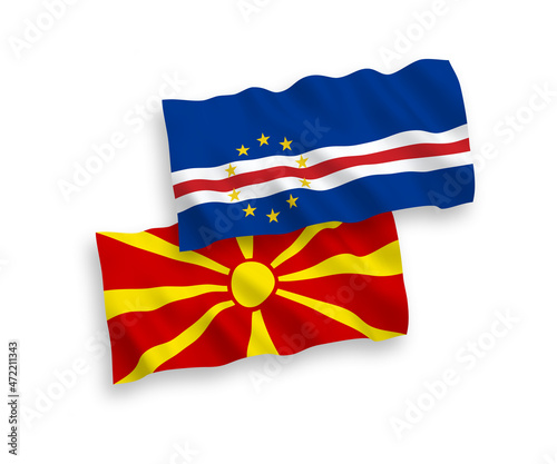 National vector fabric wave flags of Republic of Cabo Verde and North Macedonia isolated on white background. 1 to 2 proportion.