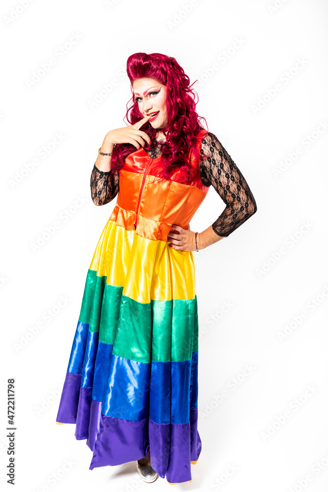Drag Queen with rainbow dress on white background. Studio shot. Drag Queen with rainbow dress on white background. Studio shot.