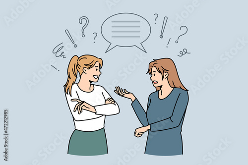 Women communicate feel confused with multicultural misunderstanding. Female colleagues talk speak in group conversation. International chat concept. Flat vector illustration. Speech bubble.