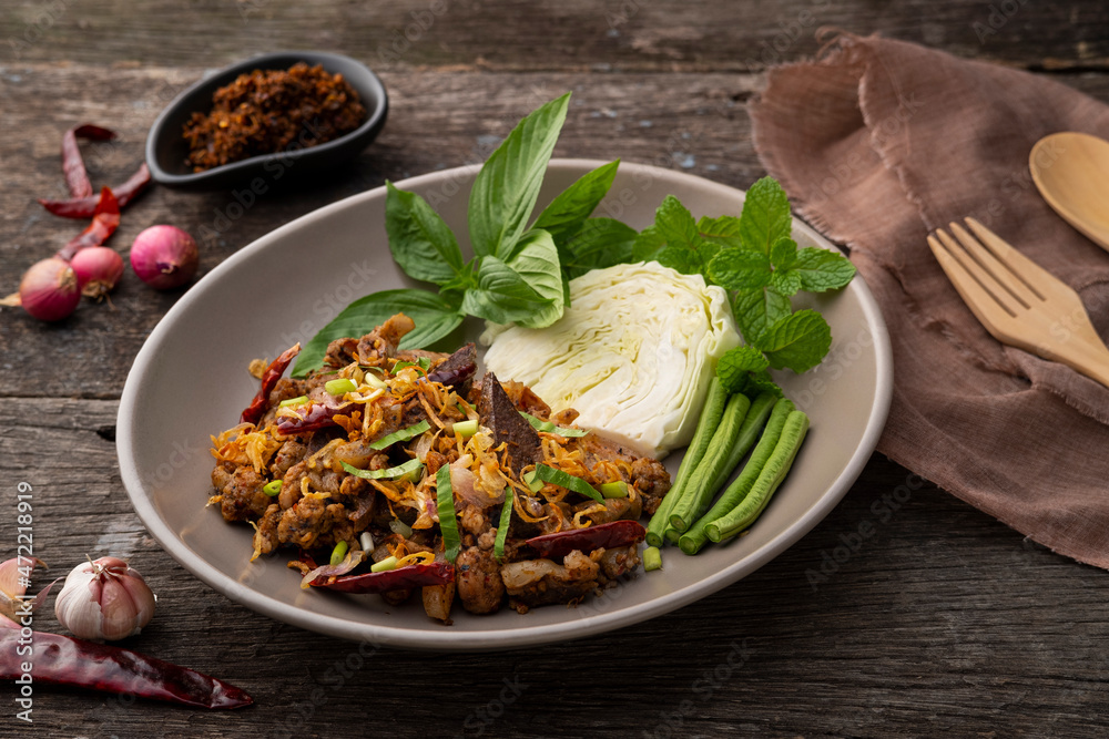 stir fried minced pork salad,Spicy Northern Thai-Style food,fry mixed Ground pork with Pork Large Intestine and pig spleen in chilli paste stir fried minced pork salad,Spicy Northern Thai-Style food,fry mixed Ground pork with Pork Large Intestine and pig spleen in chilli paste