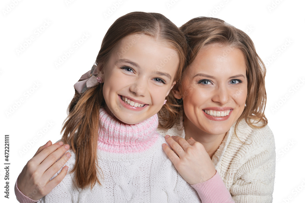 Portrait of happy mother and daughter hugging Portrait of happy mother and daughter hugging