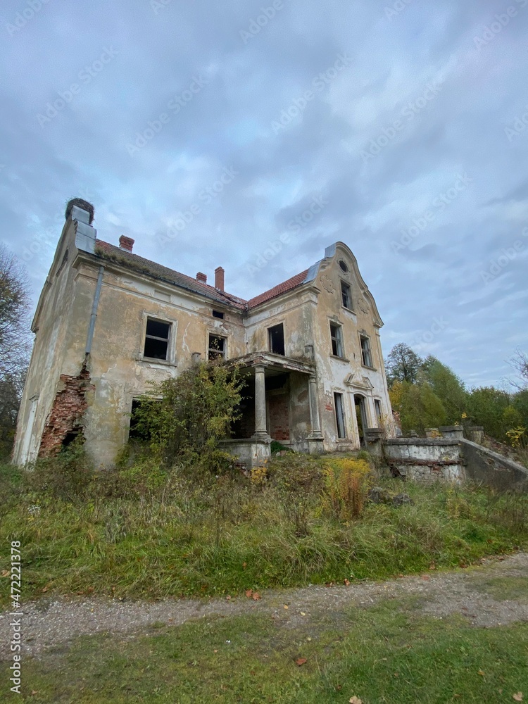 KALININGRAD REGION, RUSSIA -old estate, ruins of a brick walls building. Old ruined fortress. Stock photo. village Luzhki KALININGRAD REGION, RUSSIA -old estate, ruins of a brick walls building. Old ruined fortress. Stock photo. village Luzhki