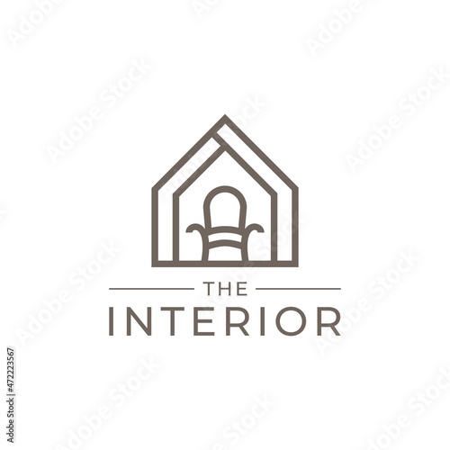 Minimalist living room interior with chair. Furniture design logotype. Home logo design with a simple armchair